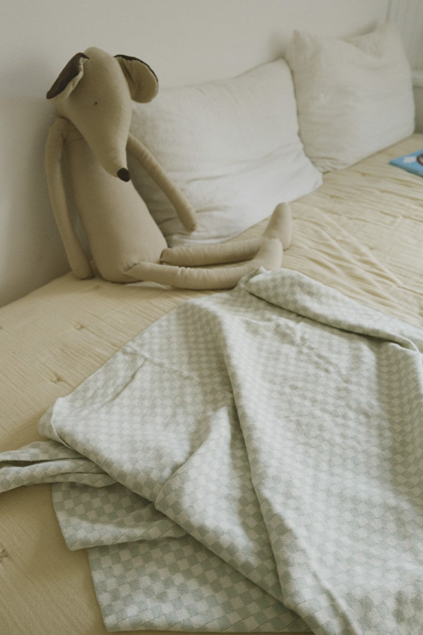 Lorena Canals knitted blanket Tiles
