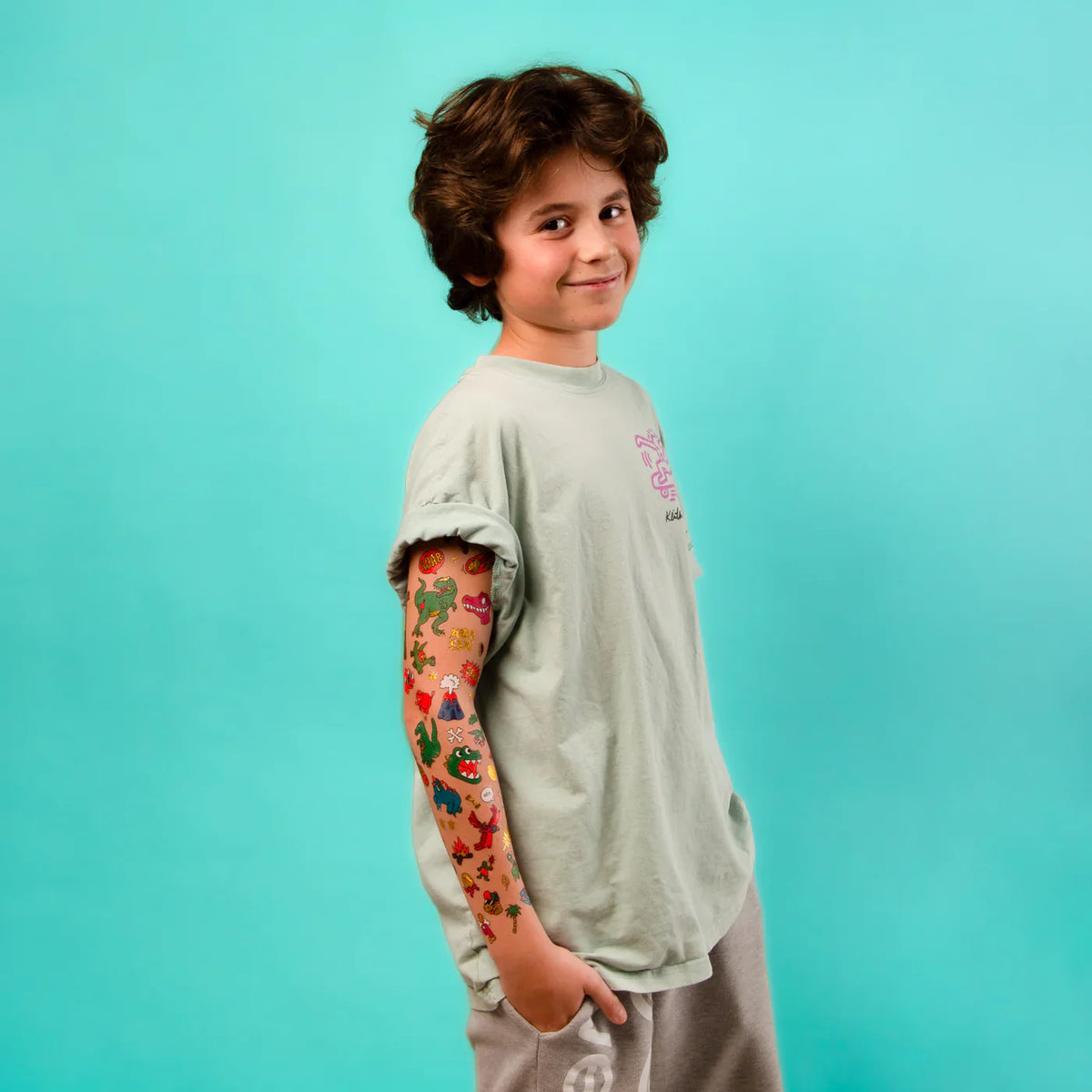 OMY tatouages dinosaures